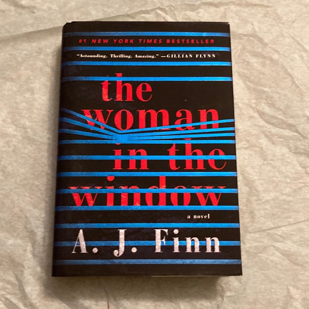 “The Woman in the Window” novel by  A.J. Finn